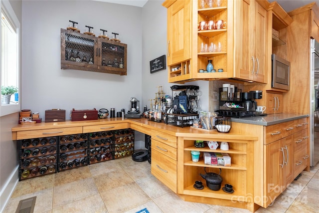 kitchen with light brown cabinets