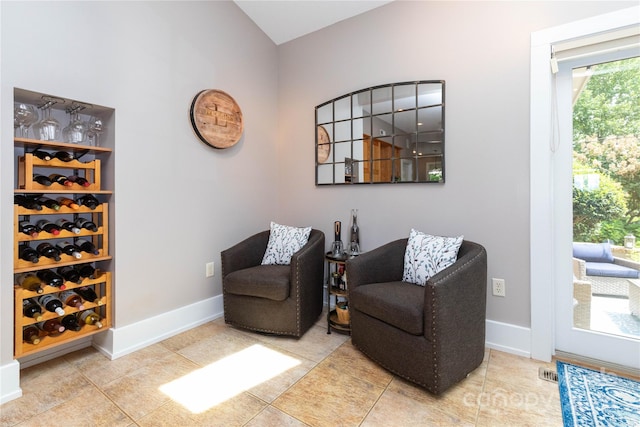 living area with light tile patterned floors