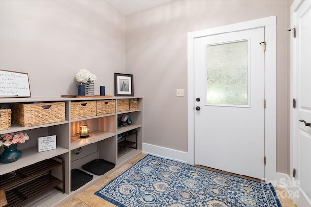 interior space featuring light tile patterned flooring