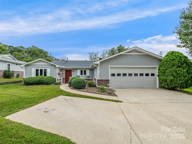 ranch-style home featuring a garage and a front yard