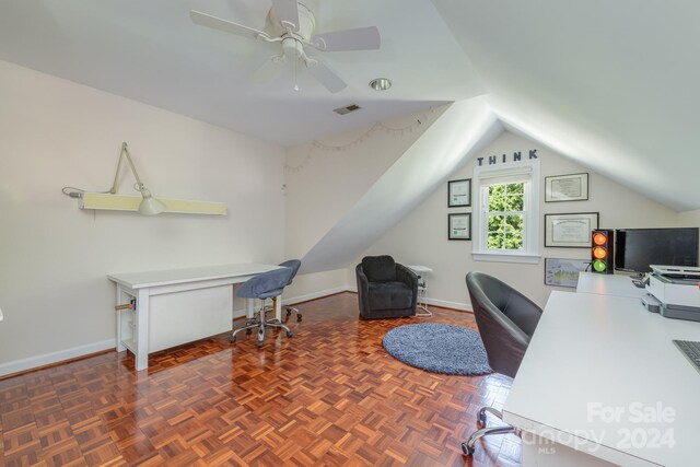 office featuring lofted ceiling, dark parquet floors, and ceiling fan