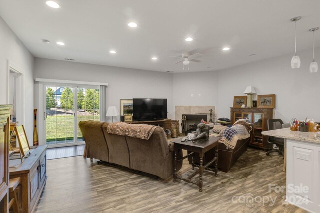 202 Ivy Ct, Morganton, NC 28655 - living area featuring ceiling fan, recessed lighting, a fireplace, and wood finished floors
