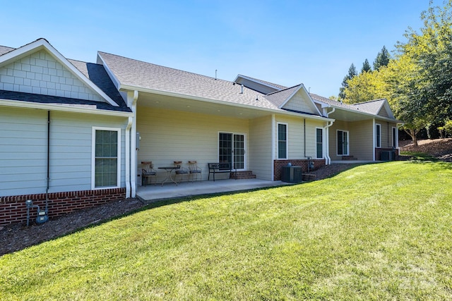 202 Ivy Ct, Morganton, NC 28655 - back of property featuring a patio, a lawn, cooling unit, and roof with shingles