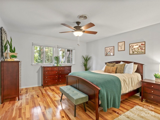 bedroom featuring light hardwood / wood-style flooring and ceiling fan