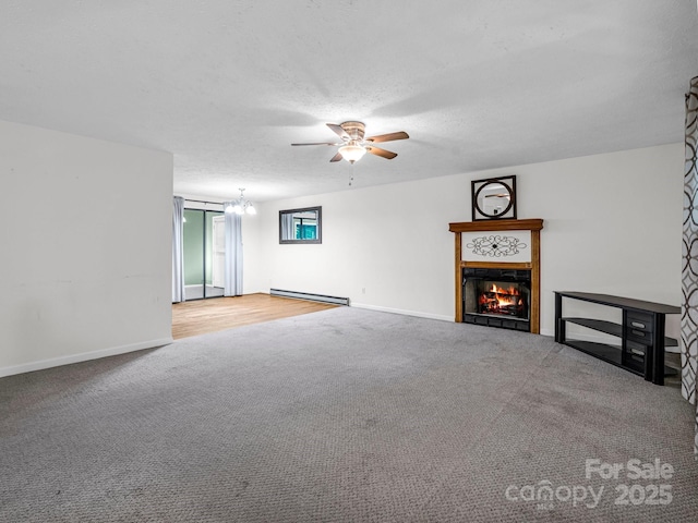 unfurnished living room with carpet flooring, a textured ceiling, ceiling fan with notable chandelier, and a baseboard radiator