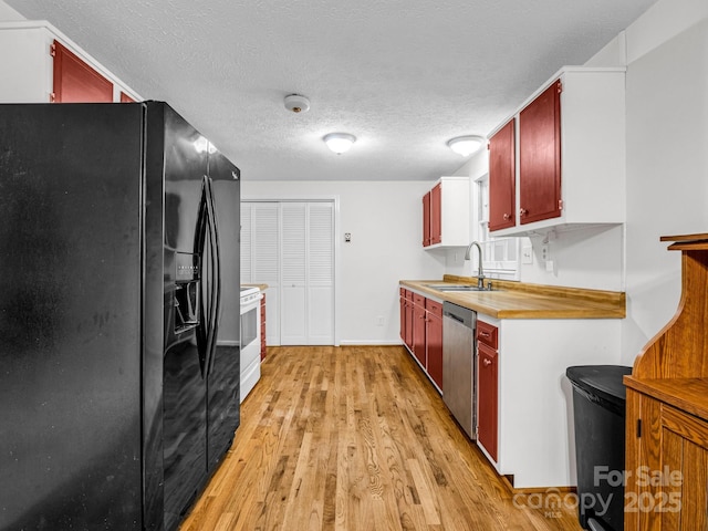 kitchen with sink, white electric range oven, stainless steel dishwasher, a textured ceiling, and black fridge with ice dispenser