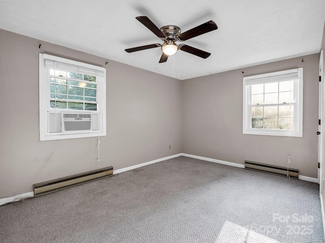 unfurnished room with carpet flooring, cooling unit, a baseboard heating unit, and ceiling fan