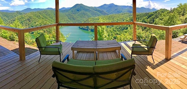 wooden terrace with a mountain view