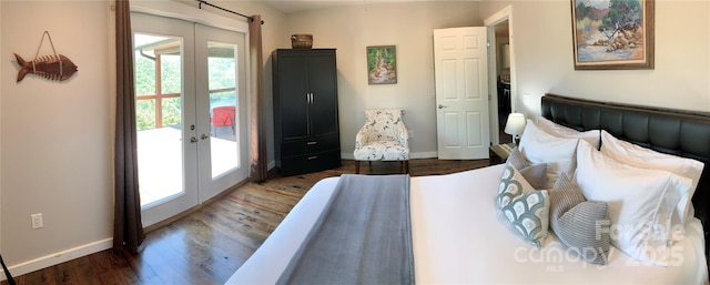 bedroom with multiple windows, access to outside, and french doors