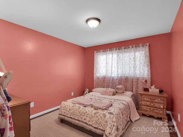 bedroom featuring carpet flooring