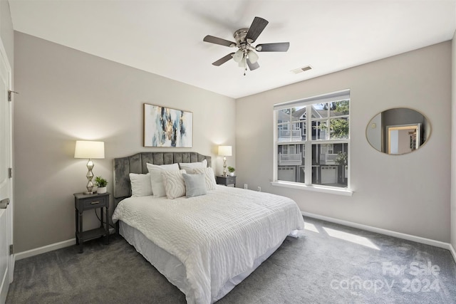 carpeted bedroom featuring ceiling fan