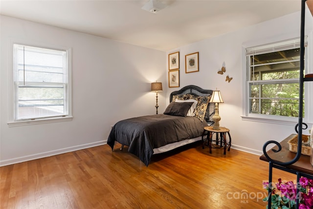 bedroom featuring hardwood / wood-style flooring