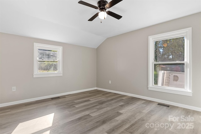 bonus room with ceiling fan, light hardwood / wood-style floors, and lofted ceiling