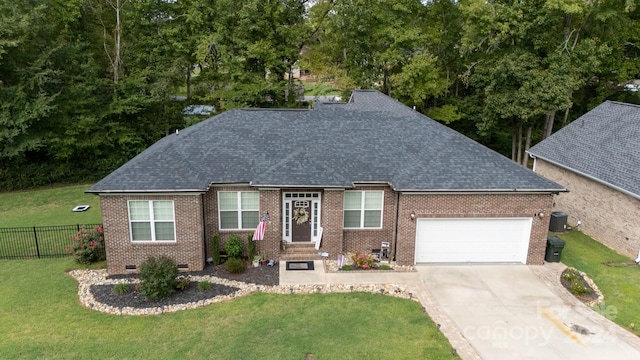 view of front of home featuring a garage, central AC, and a front yard