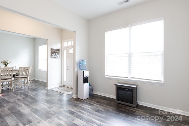 living room with dark wood-type flooring