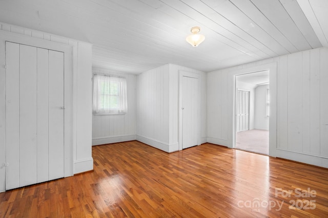 unfurnished bedroom featuring wood finished floors