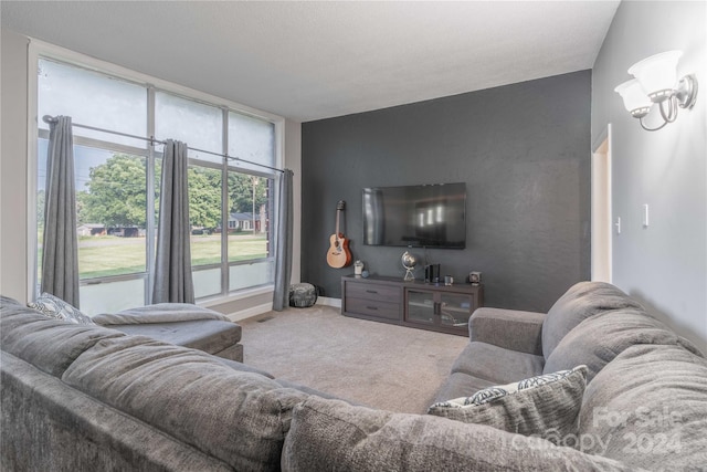 living room featuring vaulted ceiling and carpet flooring