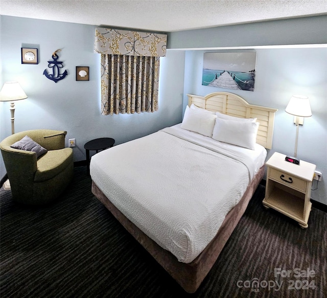 bedroom featuring a textured ceiling