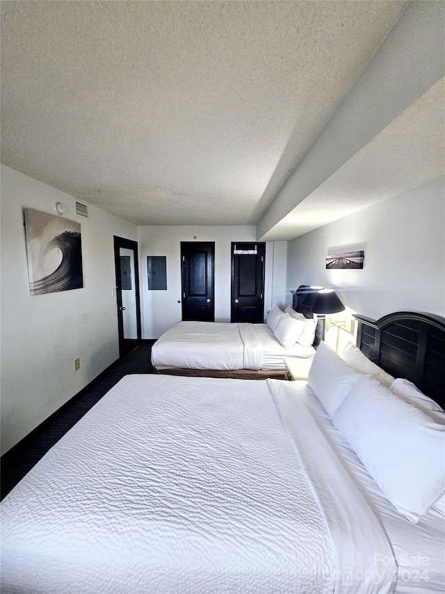 bedroom featuring a textured ceiling