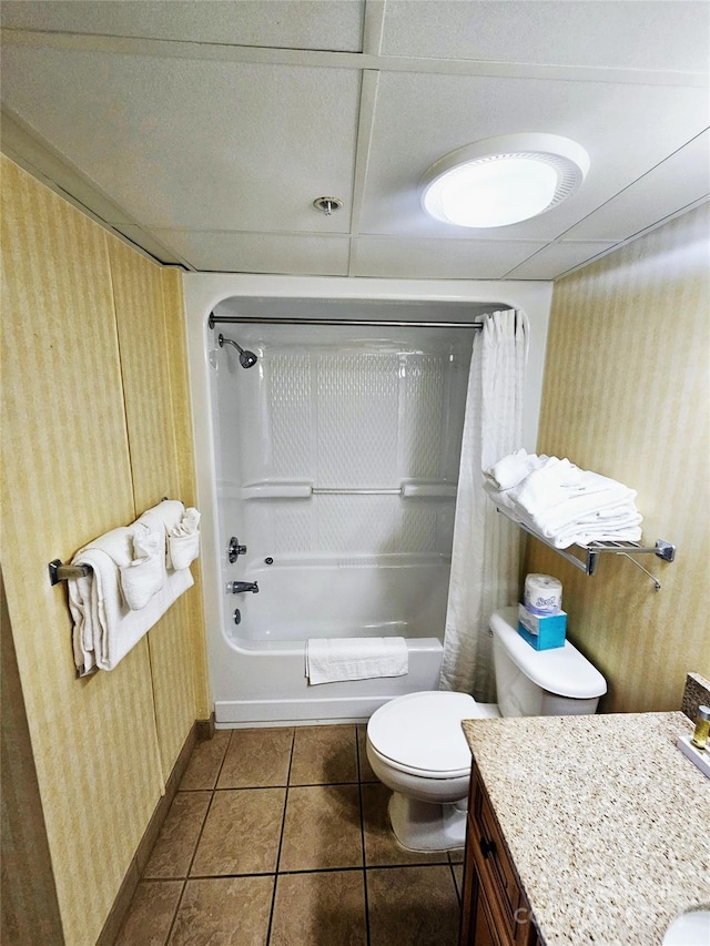 full bathroom with vanity, toilet, tile patterned floors, and shower / bath combo with shower curtain