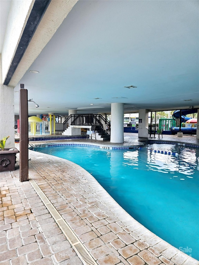 view of pool featuring a patio