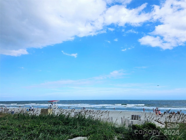 property view of water featuring a beach view