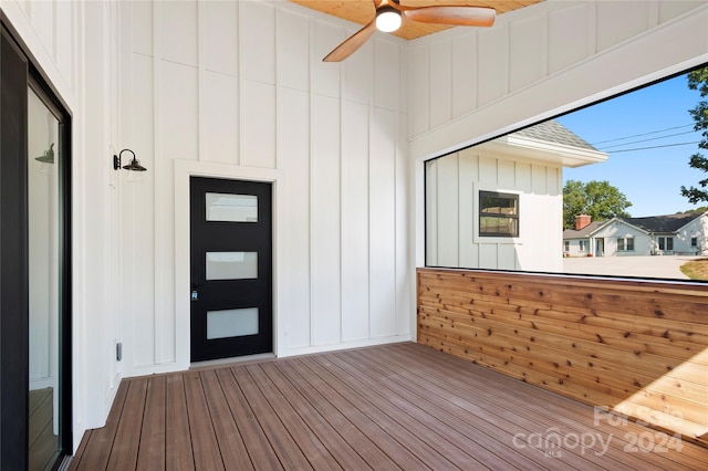 interior space featuring ceiling fan