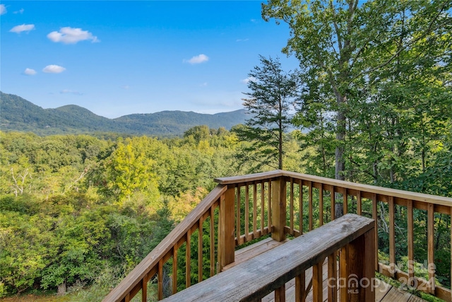 wooden terrace featuring a mountain view