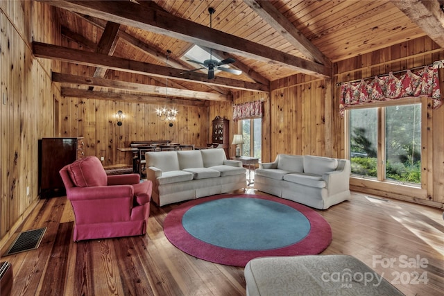 living room with wood ceiling, ceiling fan with notable chandelier, and hardwood / wood-style floors