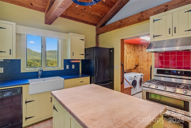 kitchen featuring black appliances, washer and clothes dryer, sink, and wooden ceiling