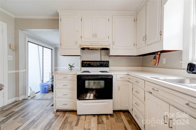 kitchen featuring white cabinets, light hardwood / wood-style flooring, custom exhaust hood, ornamental molding, and electric range