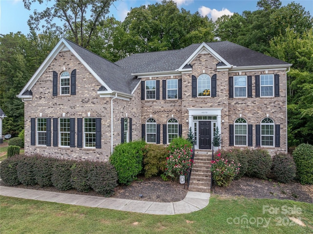 colonial house with a front lawn