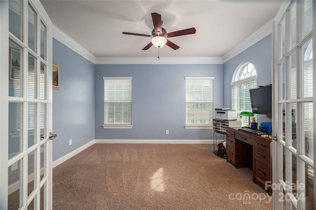 carpeted office with ceiling fan, crown molding, and french doors