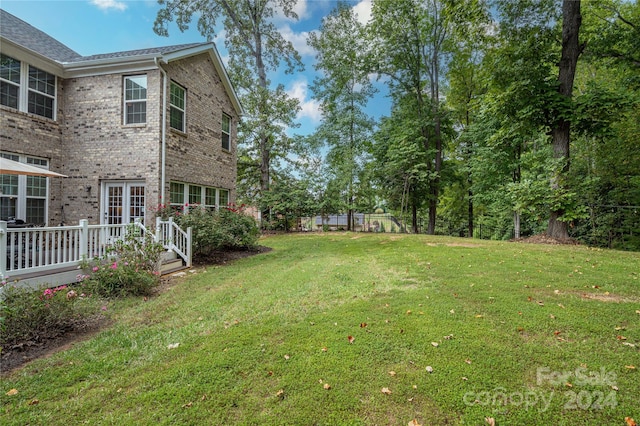 view of yard featuring a deck