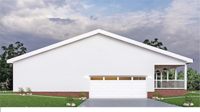 view of home's exterior featuring a lawn, a porch, and a garage