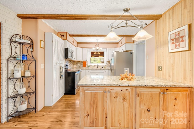 kitchen with pendant lighting, light wood-type flooring, beamed ceiling, tasteful backsplash, and stainless steel appliances