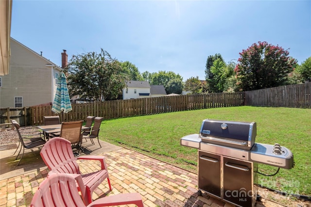 view of patio / terrace with a grill