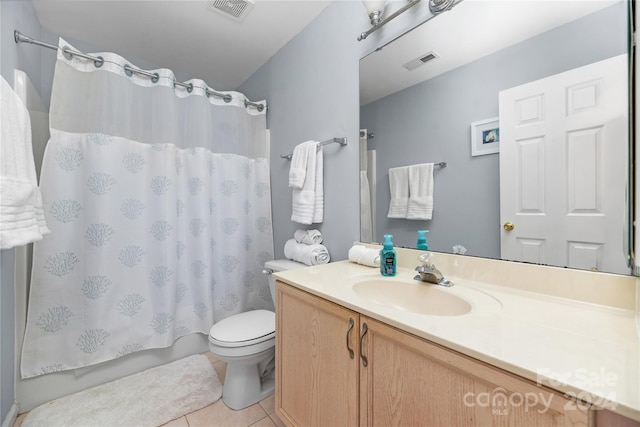 full bathroom featuring vanity, toilet, shower / tub combo with curtain, and tile patterned floors