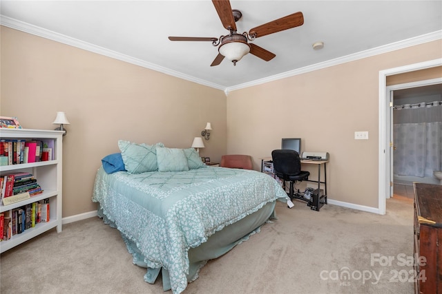 carpeted bedroom featuring crown molding and ceiling fan