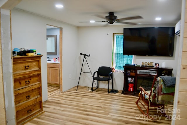 interior space with light hardwood / wood-style flooring and ceiling fan