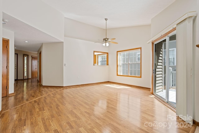 empty room featuring light hardwood / wood-style flooring and ceiling fan