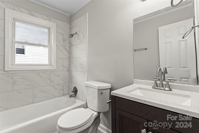 full bathroom with crown molding, tiled shower / bath combo, vanity, and toilet