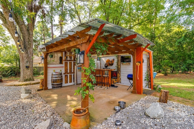 view of patio featuring a pergola