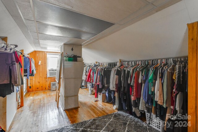 spacious closet with hardwood / wood-style floors