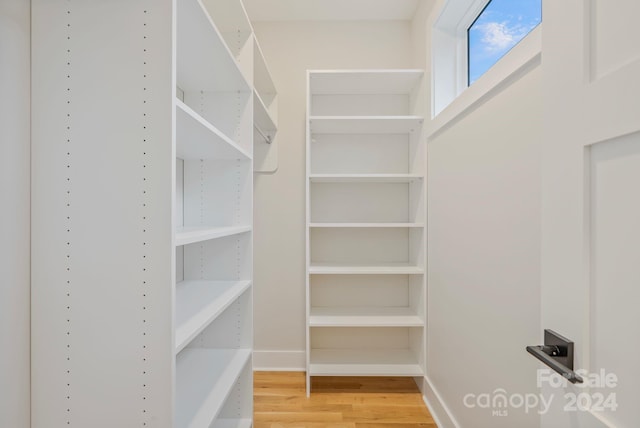 345 Riverview Dr, Asheville, NC 28806 - spacious closet with light wood finished floors