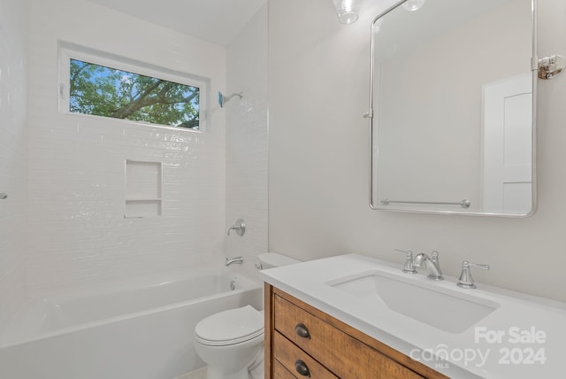 full bathroom with shower / bathing tub combination, vanity, and toilet