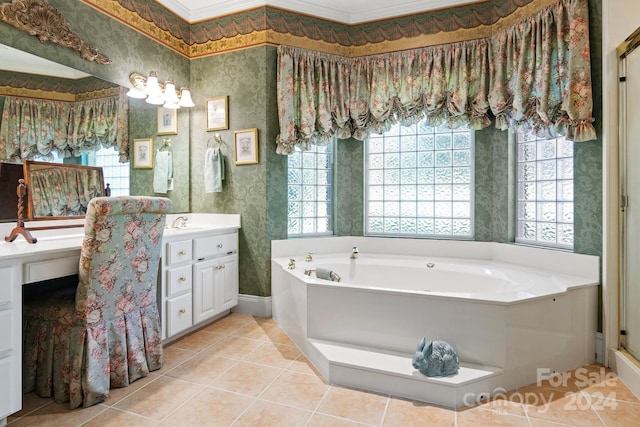 bathroom featuring crown molding, vanity, a bathing tub, and tile patterned flooring