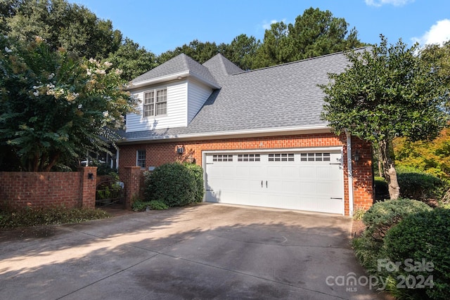 front of property featuring a garage