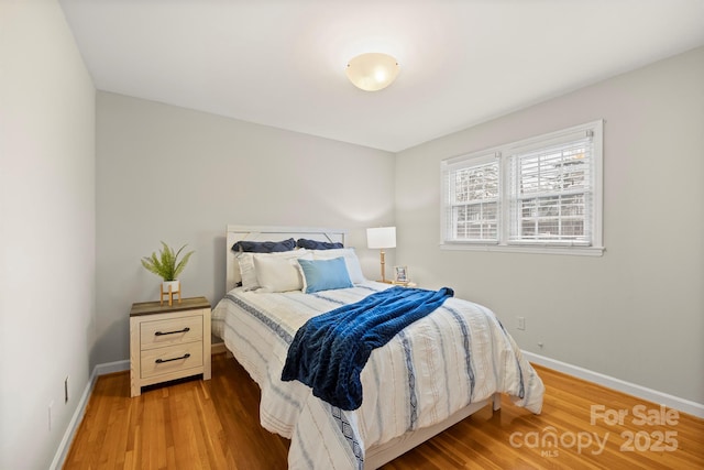 bedroom featuring hardwood / wood-style floors