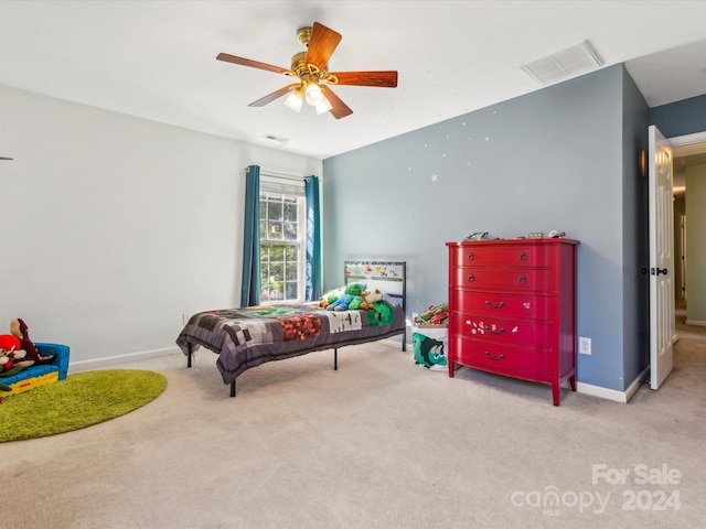 carpeted bedroom featuring ceiling fan